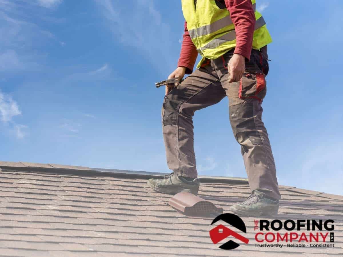A Professional Roofing Contractor Doing a Roof Inspection In Mesa, AZ.